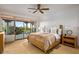 Bedroom with a large sliding glass door and patio views at 10712 E Prospect Point Dr, Scottsdale, AZ 85262
