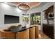 Dining room featuring mountain views, elegant furniture and fixtures, and custom built-ins at 10712 E Prospect Point Dr, Scottsdale, AZ 85262