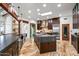Spacious kitchen with large islands, stainless steel appliances, and custom cabinetry at 10712 E Prospect Point Dr, Scottsdale, AZ 85262