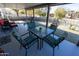 Inviting covered patio with an outdoor dining set, perfect for enjoying meals outdoors at 10906 W Boswell Blvd, Sun City, AZ 85373