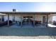 Covered patio with comfortable seating, ideal for outdoor relaxation and entertaining guests at 10906 W Boswell Blvd, Sun City, AZ 85373