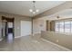 Versatile living space with tiled floors, neutral tones, and easy access to the outdoors for seamless indoor-outdoor living at 1203 E Judi St, Casa Grande, AZ 85122