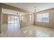 Bright living area featuring tile flooring, lots of natural light, and a seamless transition to the backyard at 1203 E Judi St, Casa Grande, AZ 85122