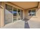 Covered patio with view of sliding glass doors and window, offering outdoor living space at 1203 E Judi St, Casa Grande, AZ 85122