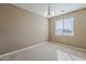 Room with natural light from a window with neutral carpet and paint at 1203 E Judi St, Casa Grande, AZ 85122