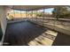 Enclosed sunroom overlooking the landscaped backyard at 12415 W Rock Springs Dr, Sun City West, AZ 85375