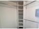 Large walk-in closet with ample shelving and hanging space at 13709 W Gunsight Dr, Sun City West, AZ 85375