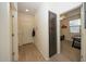 Light and bright hallway with access to bedrooms and storage at 14870 W Encanto Blvd # 1014, Goodyear, AZ 85395