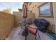 Small patio with table, chairs, and grill at 14870 W Encanto Blvd # 1014, Goodyear, AZ 85395