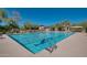 Community lap pool with lanes and seating area at 16389 N 108Th Pl, Scottsdale, AZ 85255