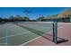 Tennis court with net and painted lines at 16389 N 108Th Pl, Scottsdale, AZ 85255