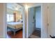 Bedroom view from doorway features wood floors, ceiling fan and a window overlooking the exterior at 1885 E Sycamore E Rd, Casa Grande, AZ 85122