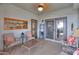 Relaxing covered patio area with comfortable seating, perfect for outdoor entertaining and enjoying the Arizona weather at 1885 E Sycamore E Rd, Casa Grande, AZ 85122