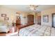 Bright main bedroom with sitting area and ensuite bathroom and closet at 1885 E Sycamore E Rd, Casa Grande, AZ 85122