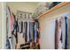 Organized walk-in closet with ample shelving and hanging space for clothes and accessories at 1885 E Sycamore E Rd, Casa Grande, AZ 85122