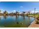 Lake with shaded seating area at 2303 N General Dr, Florence, AZ 85132