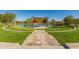 Amphitheater style park with pond and grassy areas at 2303 N General Dr, Florence, AZ 85132