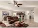 Open concept living area with a kitchen island and brown furniture at 2303 N General Dr, Florence, AZ 85132