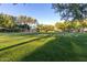 Lush green space with a gazebo and playground in the background at 2303 N General Dr, Florence, AZ 85132