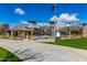 Entrance to a playground with covered seating nearby at 2303 N General Dr, Florence, AZ 85132