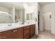 Double vanity bathroom with a walk-in shower at 2303 N General Dr, Florence, AZ 85132