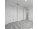 Well-lit bedroom with carpet, closet, and neutral walls at 24216 W Agora Ln Ln, Buckeye, AZ 85326