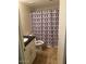 Clean bathroom with shower/tub combo and updated vanity at 2447 W Emile Zola Ave, Phoenix, AZ 85029