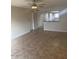 Spacious living area with tile flooring and lots of natural light at 2447 W Emile Zola Ave, Phoenix, AZ 85029