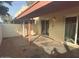 Covered patio with tile flooring and gravel at 2447 W Emile Zola Ave, Phoenix, AZ 85029