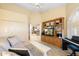 Cozy living room with closet, soft neutral colors, piano, and built-in shelves for storing your books at 25625 N Abajo Dr, Rio Verde, AZ 85263