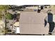 Aerial view of the house featuring a backyard patio, desert landscaping, and a well maintained tile roof at 3055 N Red Mtn # 156, Mesa, AZ 85207