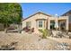 Beautiful backyard featuring multiple seating areas, a desert landscape, and well-maintained patio at 3055 N Red Mtn # 156, Mesa, AZ 85207