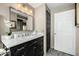 Bathroom with marble vanity and built-in storage at 3236 E Chandler Blvd # 2053, Phoenix, AZ 85048