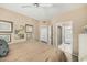 Bedroom with ensuite bathroom and ceiling fan at 3236 E Chandler Blvd # 2053, Phoenix, AZ 85048