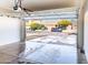 Two car garage with automatic opener, showing view of street at 3307 W Leodra Ln, Phoenix, AZ 85041