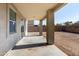 Covered patio with access from sliding glass door at 3307 W Leodra Ln, Phoenix, AZ 85041