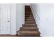 Carpeted staircase leading to the upper level of the home at 3307 W Leodra Ln, Phoenix, AZ 85041