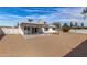 Large backyard with gravel and a covered patio at 3513 W Danbury Dr, Glendale, AZ 85308