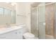 Clean bathroom with a shower and tile surround at 3513 W Danbury Dr, Glendale, AZ 85308