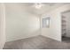 Bright bedroom with carpet, ceiling fan, and ample closet space at 3513 W Danbury Dr, Glendale, AZ 85308