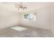 Bright bedroom with tile flooring and ceiling fan at 3513 W Danbury Dr, Glendale, AZ 85308