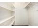 Roomy closet with shelving and hanging rods at 3513 W Danbury Dr, Glendale, AZ 85308