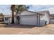 Single-story house with a two-car garage and desert landscaping at 3513 W Danbury Dr, Glendale, AZ 85308