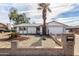 Single-story house with a two-car garage and desert landscaping at 3513 W Danbury Dr, Glendale, AZ 85308