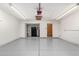 Clean and spacious garage with epoxy flooring at 3513 W Danbury Dr, Glendale, AZ 85308