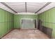 Empty workshop with metal walls and a concrete floor at 3513 W Danbury Dr, Glendale, AZ 85308