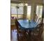 Kitchen dining area with wood table and chairs at 3554 E Camino Cir, Mesa, AZ 85213