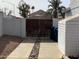 Private gated entry with storage shed at 3554 E Camino Cir, Mesa, AZ 85213