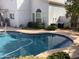 Sparkling pool with patio and a lemon tree located in the backyard at 3554 E Camino Cir, Mesa, AZ 85213