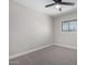 Light-filled bedroom featuring ceiling fan and new carpet at 4432 E Belleview St, Phoenix, AZ 85008